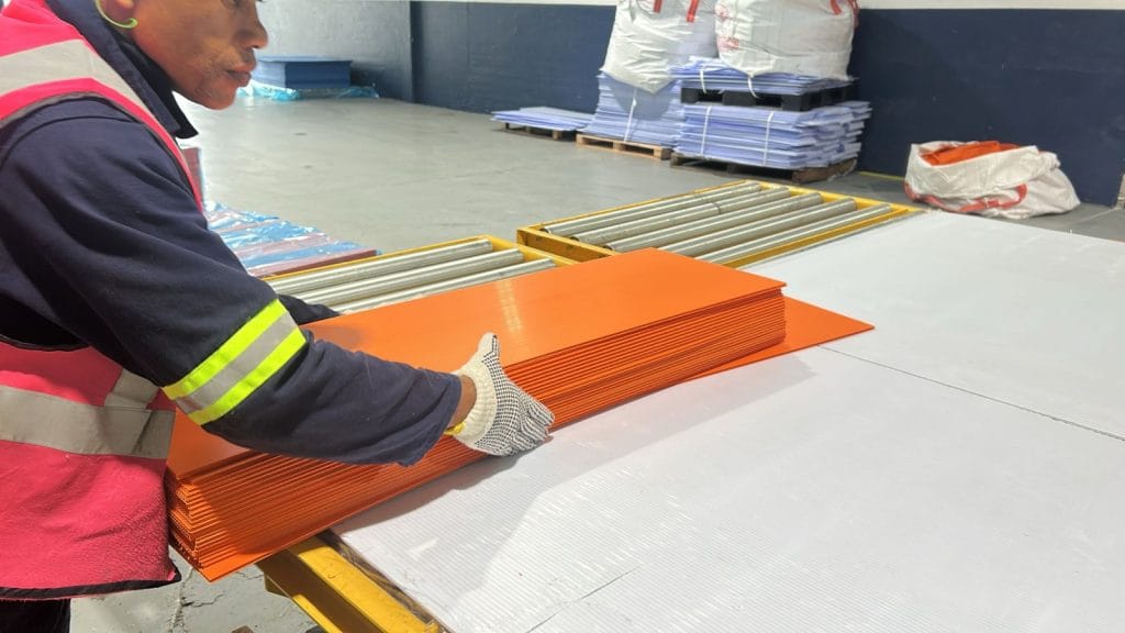 Photo of a worker at Apex Polymers
